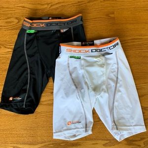 Shock doctor athletic shorts bundle of two both boys large - One white one black